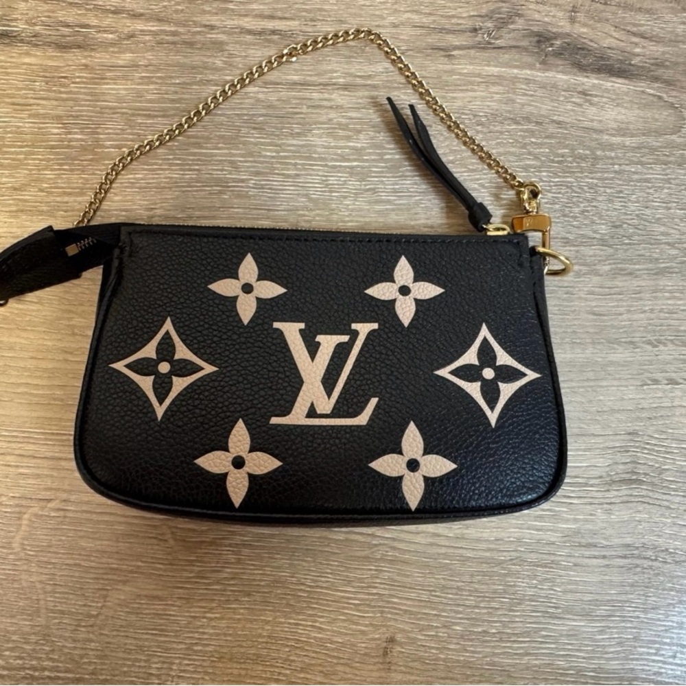 Limited Edition Louis Vuitton Black and Tan Clutch with Monogram Pattern